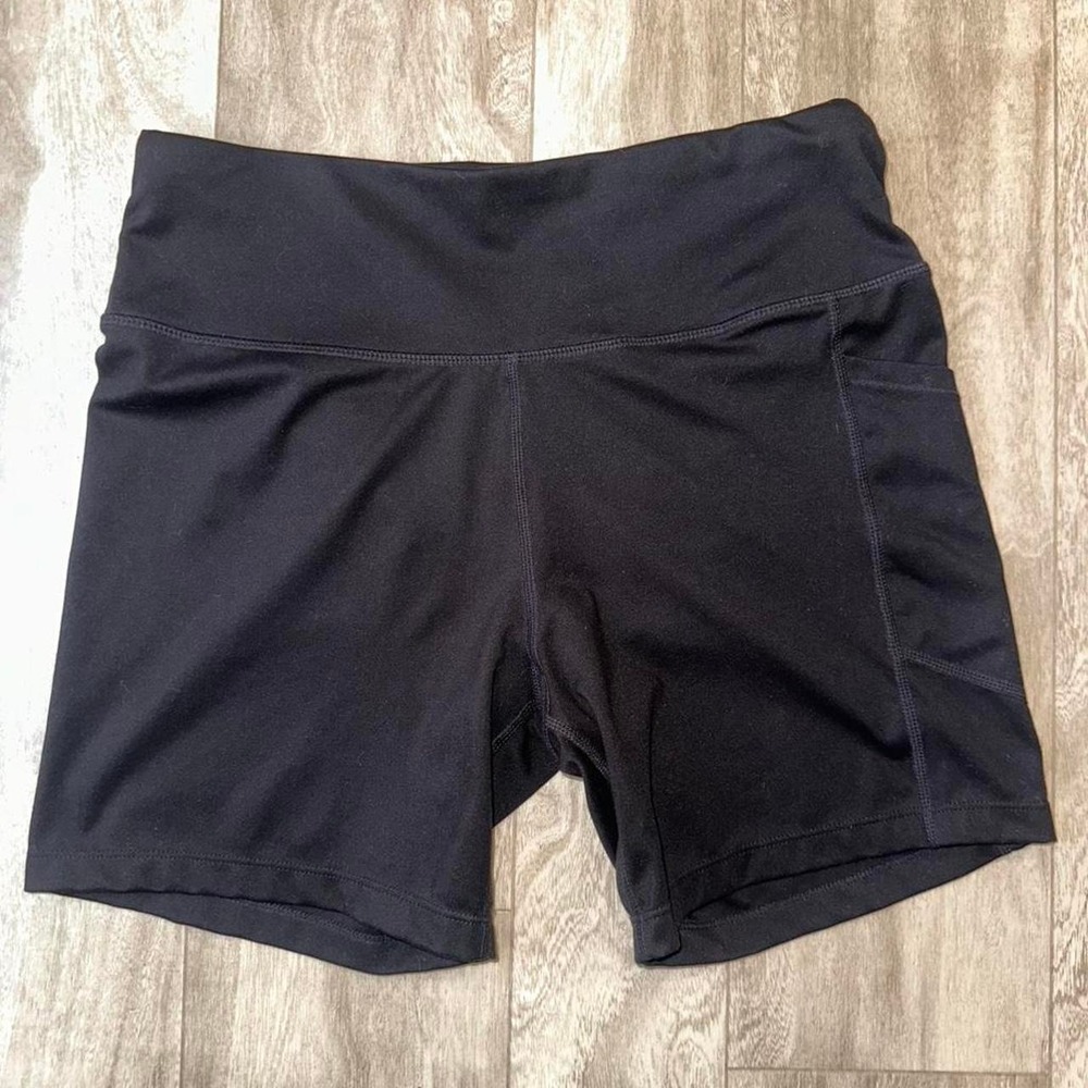 Black Calvin Klein performance stretch high-waisted workout shorts with pockets